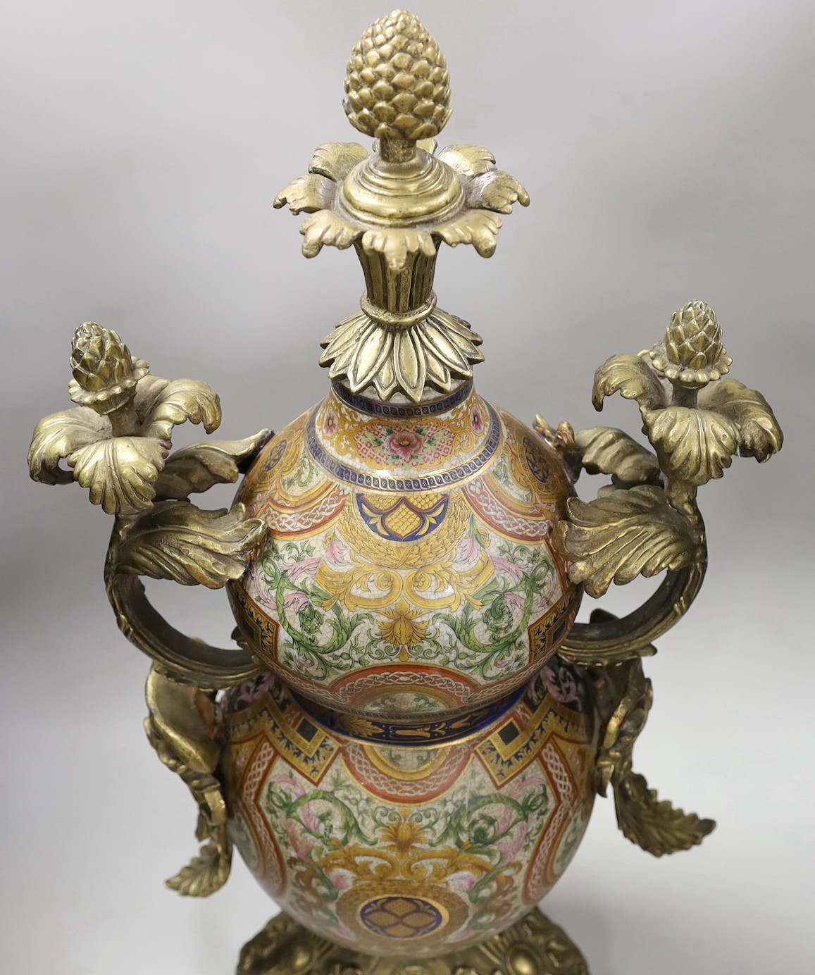 A large Louis XV-style ormolu-mounted ceramic urn. 69.5cm high